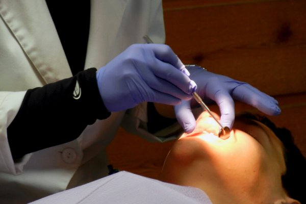 Cirurgião dentista e paciente